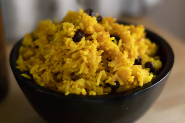 South African Yellow rice in a wooden bowl